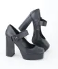 1970s Black Leatherette Platform Mary Jane Heels sold by Unique Vintage