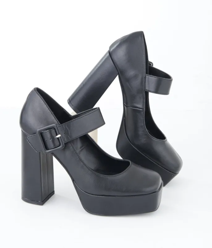 1970s Black Leatherette Platform Mary Jane Heels sold by Unique Vintage
