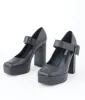 1970s Black Leatherette Platform Mary Jane Heels sold by Unique Vintage