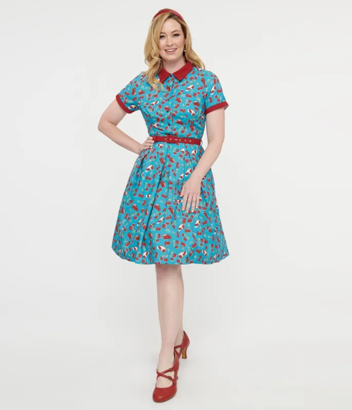 Collectif 1950s Blue & Red Cherry Pie Swing Dress sold by Unique Vintage