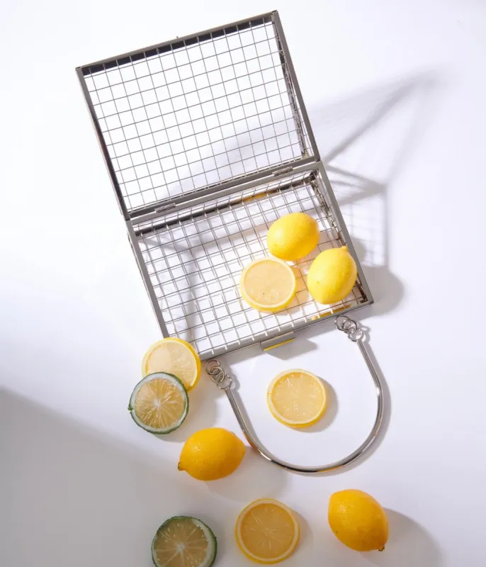 Silver Metal Triangle Handbag sold by Unique Vintage