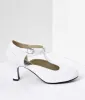 1920s White T-Strap Mary Jane Kitten Heels sold by Unique Vintage