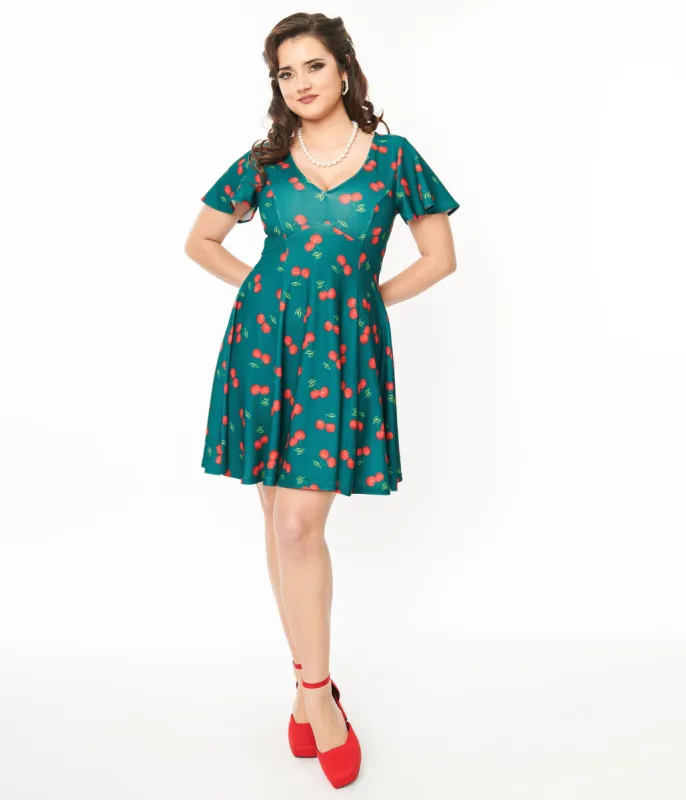 Unique Vintage 1950s Emerald & Cherry Print Poppy Flare Dress sold by Unique Vintage