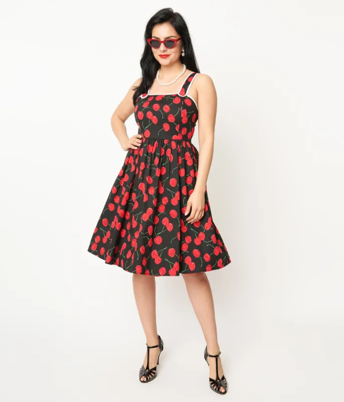 Unique Vintage 1950s Black & Cherry Print Cotton Pinafore Swing Dress sold by Unique Vintage