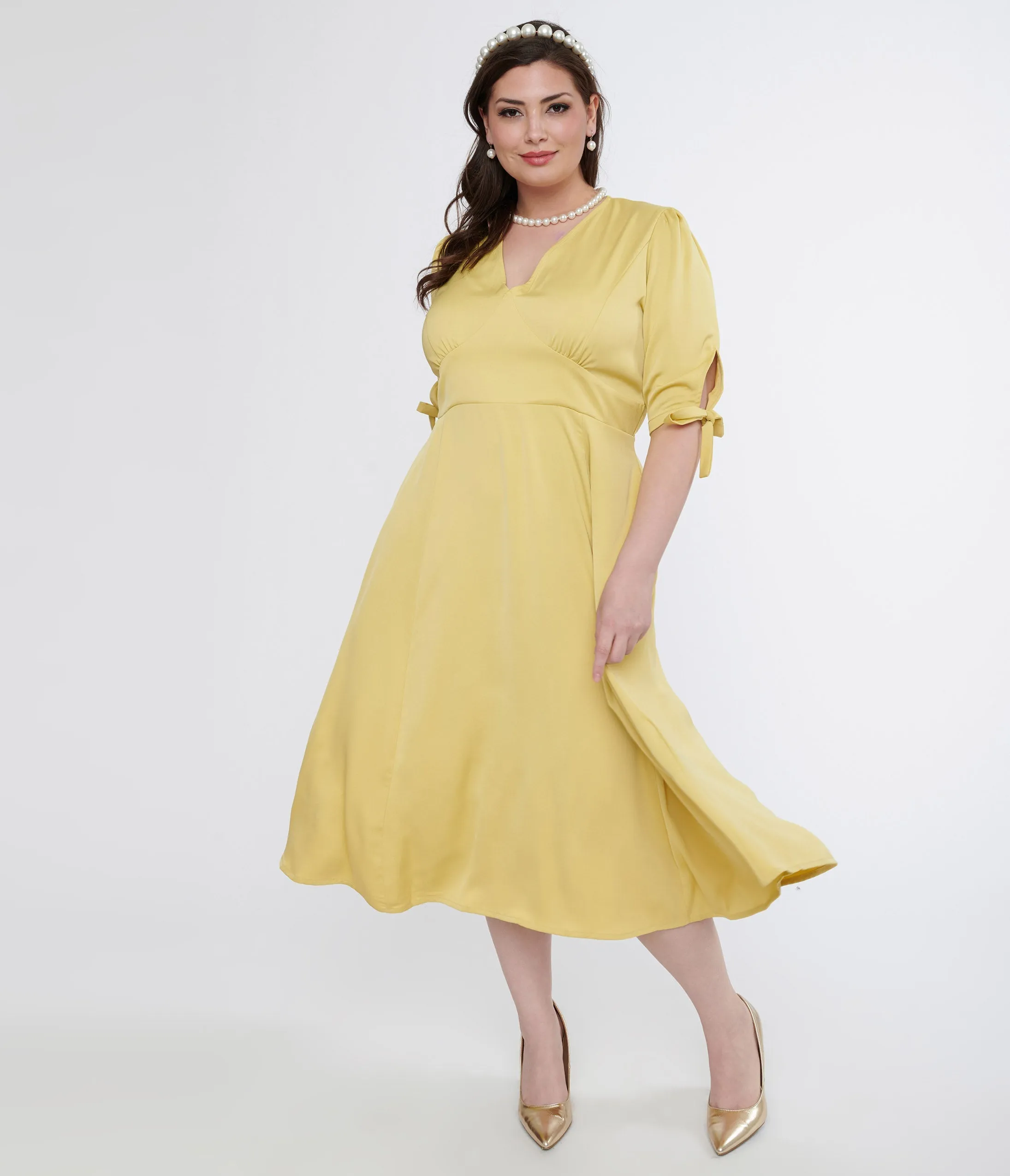 Plus Size 1940s Yellow Bella Swing Dress sold by Unique Vintage