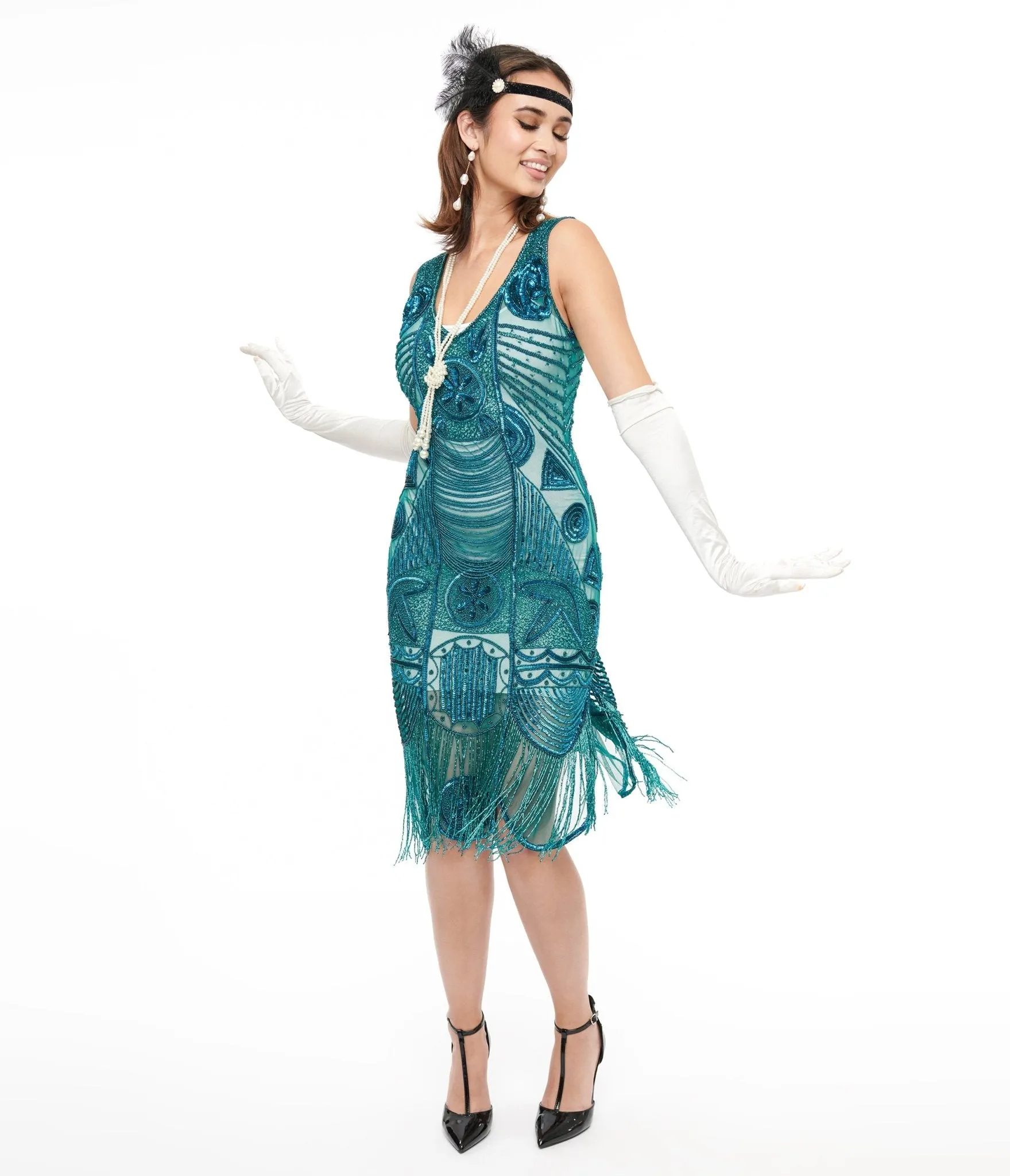 Unique Vintage 1920s Style Teal Hand Beaded Fringe Bosley Flapper Dress sold by Unique Vintage