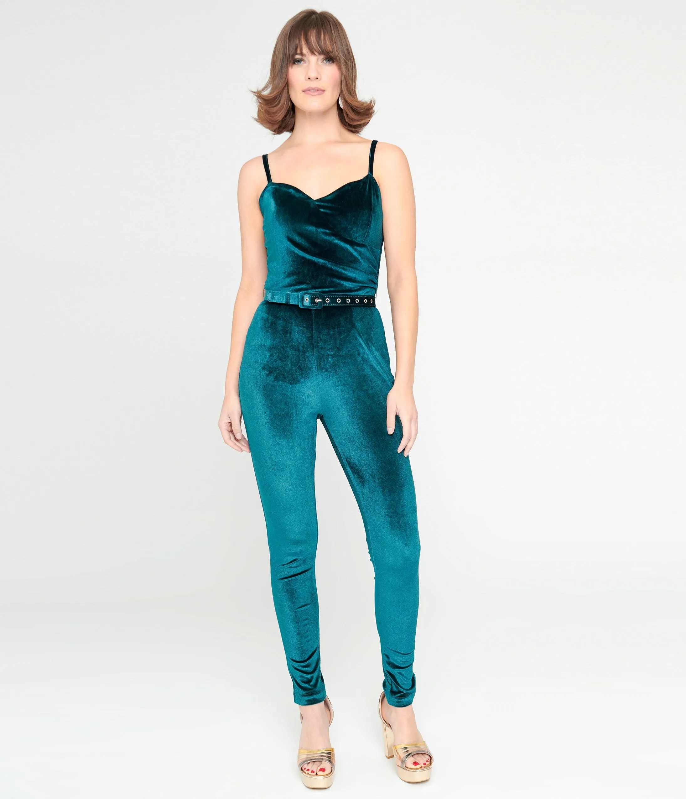 Unique Vintage 1970s Teal Velvet Jumpsuit sold by Unique Vintage