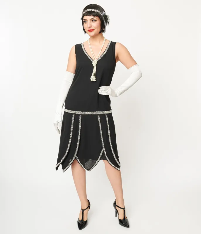 Unique Vintage 1920s Black & Pearl Beaded Petal Flapper Dress sold by Unique Vintage