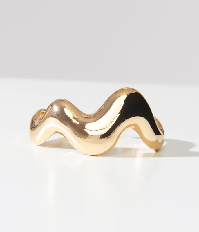 1960s Gold Wavy Bracelet sold by Unique Vintage