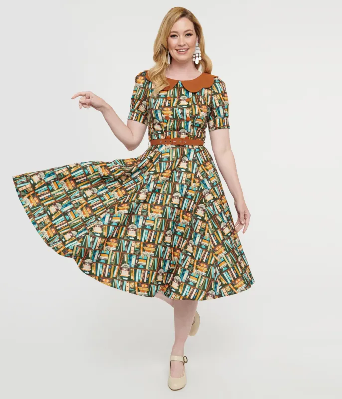 Collectif 1950s Brown Book Print Brenda Swing Dress sold by Unique Vintage
