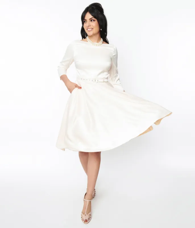 Unique Vintage 1950s Ivory Satin Devon Swing Dress sold by Unique Vintage