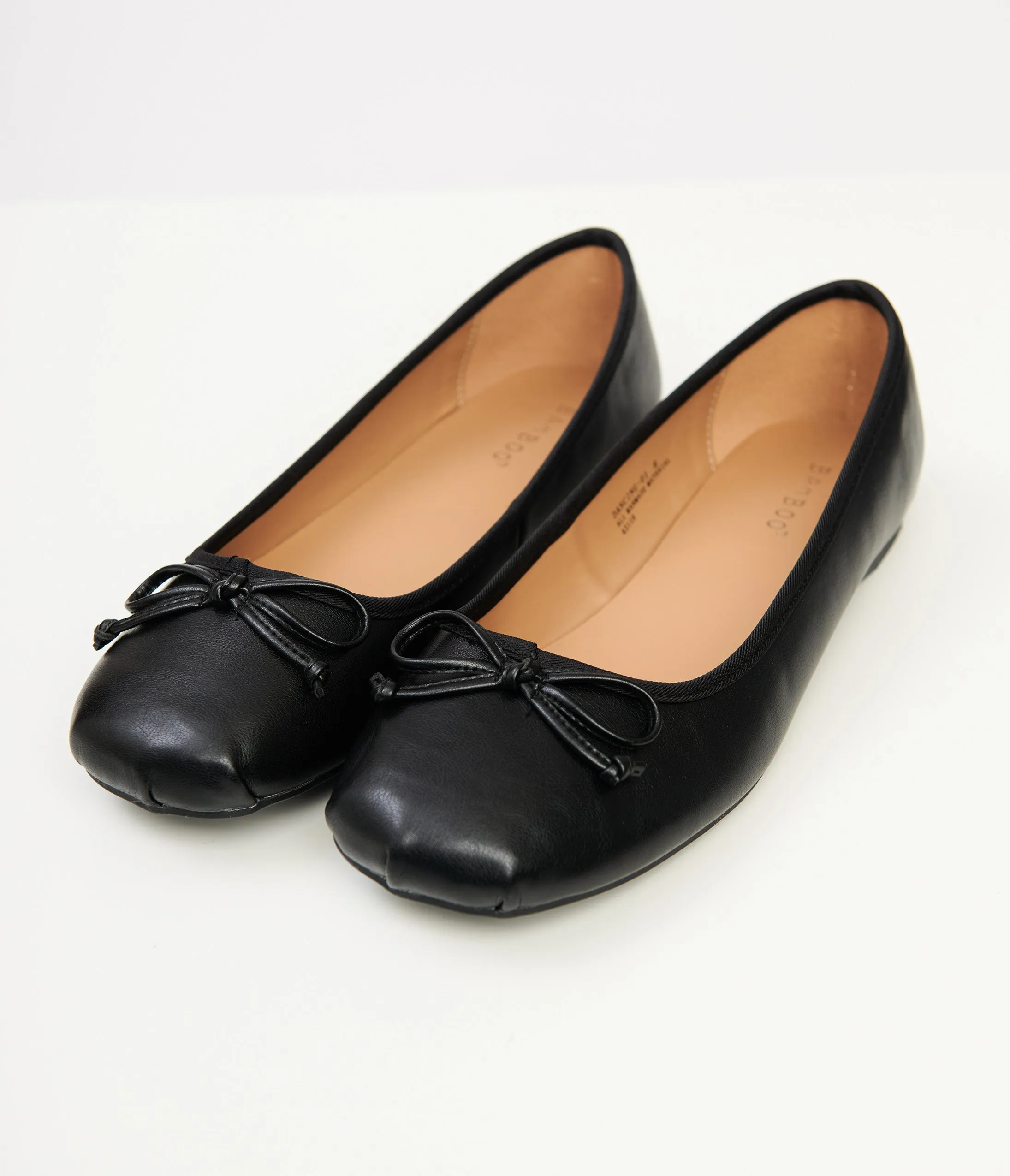 1960s Black Bow Ballet Flats sold by Unique Vintage