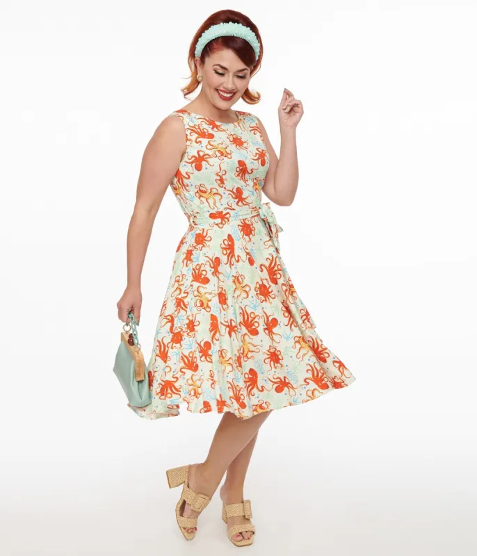 1950s Retro Orange Octopus Print Swing Dress made by Unique Vintage