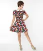 Smak Parlour Black & Rainbow Dot Smocked Fit & Flare Dress sold by Unique Vintage