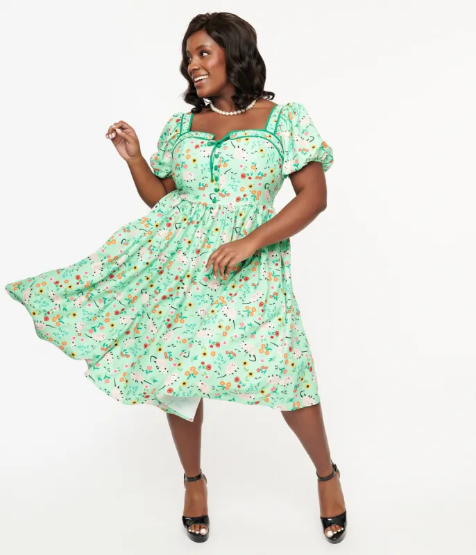 Unique Vintage Plus Size 1940s Green Possum Print Button Front Dress sold by Unique Vintage