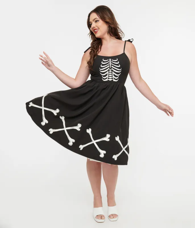 Unique Vintage 1950s Black & Glow in the Dark Skeleton Bobbie Swing Dress sold by Unique Vintage