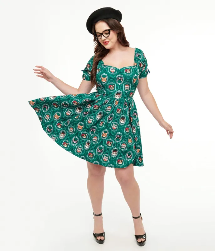 Unique Vintage 1950s Teal Cat Print Swing Dress sold by Unique Vintage