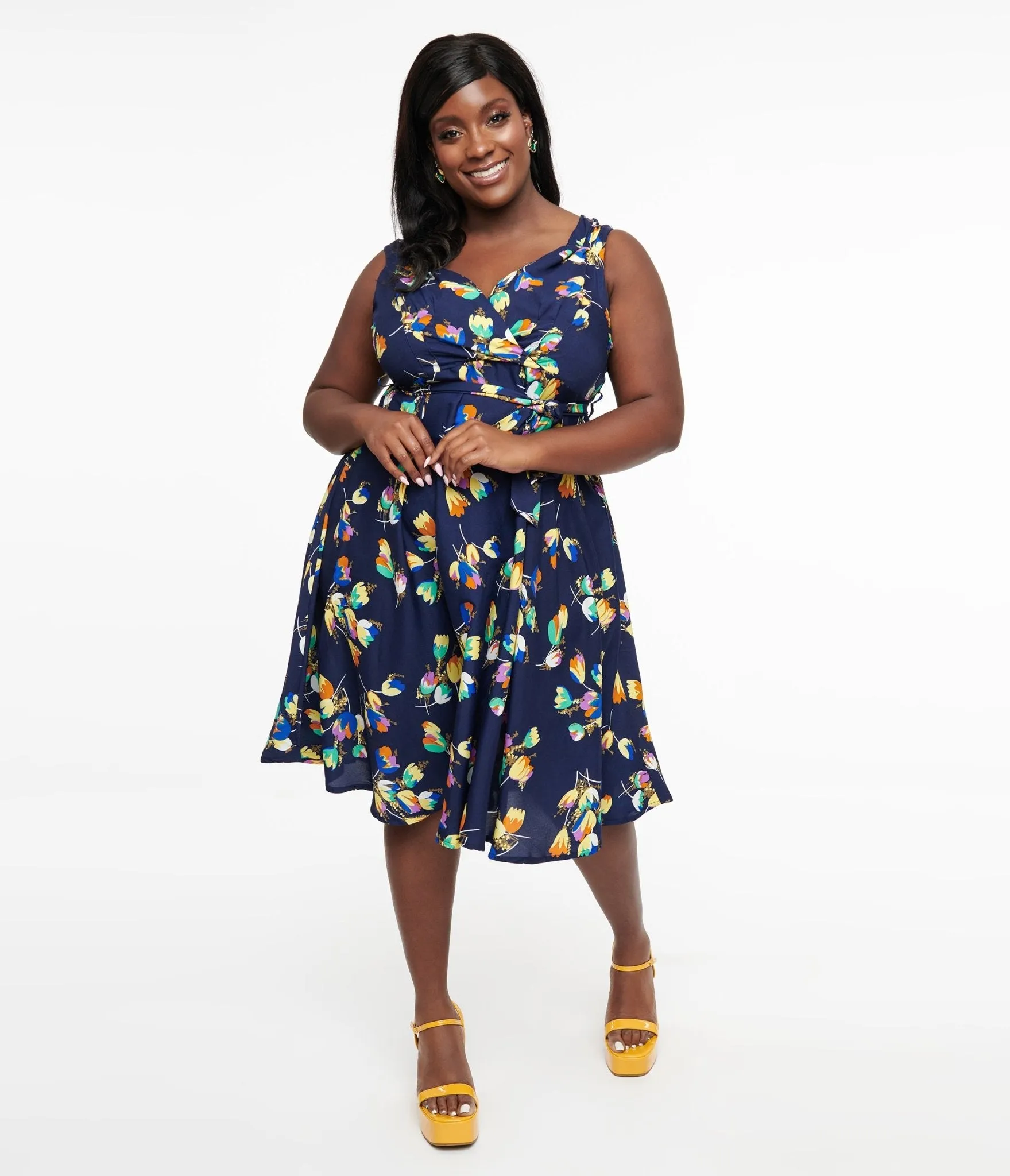 Plus Size 1950s Navy Floral Print Swing Dress sold by Unique Vintage