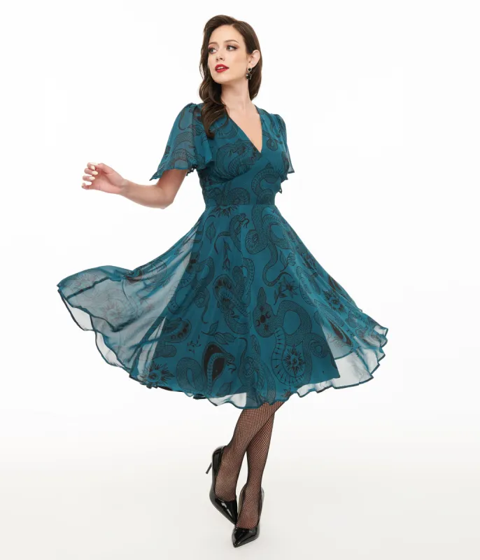 Hell Bunny Teal Snake Venom Midi Dress sold by Unique Vintage