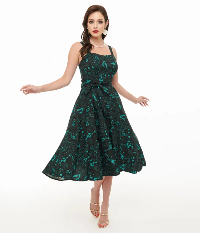 Miss Lulo 1950s Teal Sea Witch Print Lori Swing Dress sold by Unique Vintage