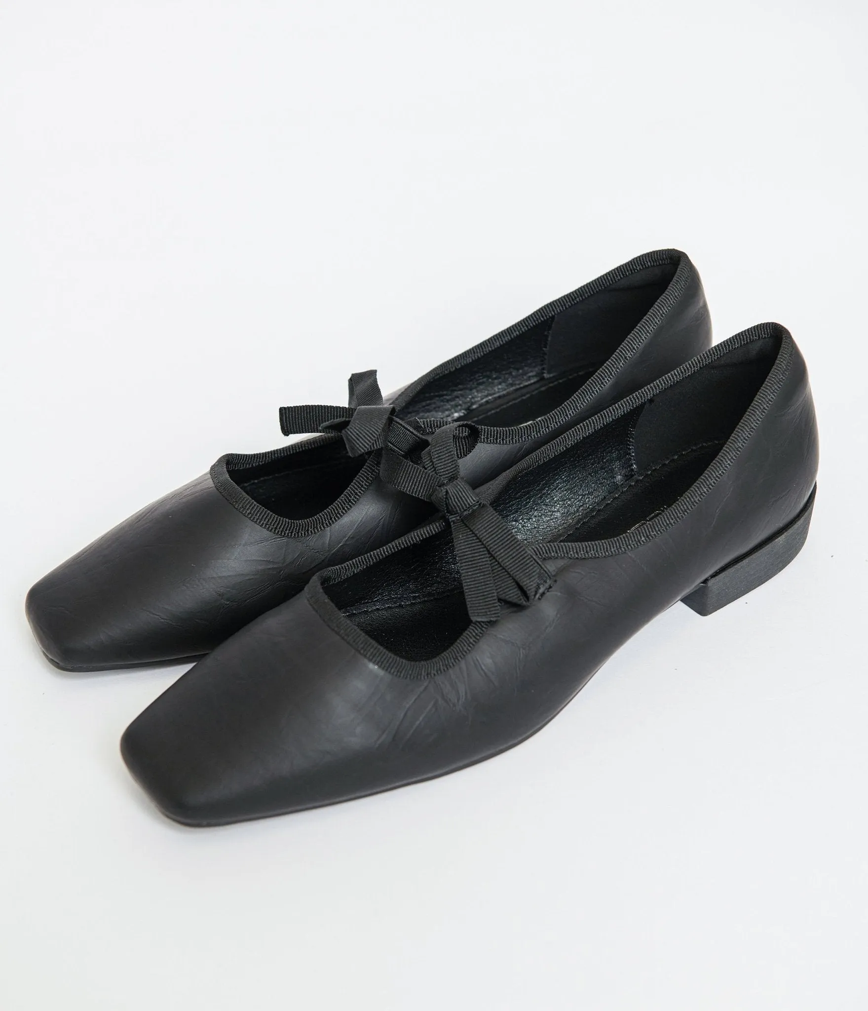 1960s Black Leatherette Bow Strap Flats sold by Unique Vintage