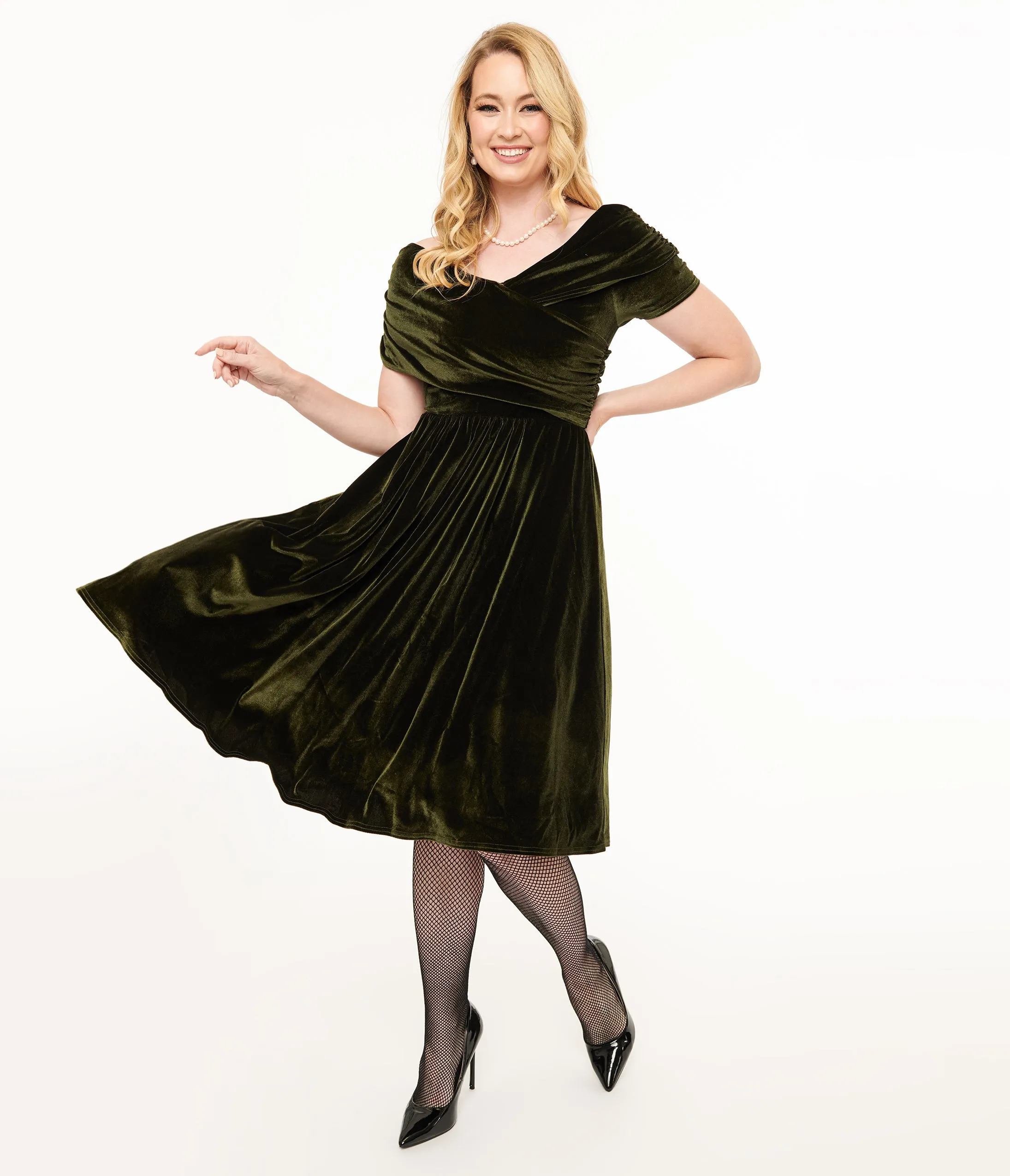 Unique Vintage 1950s Olive Green Shirred Velvet Swing Dress sold by Unique Vintage