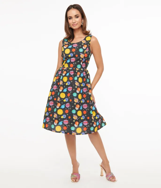 1950s Black & Multicolor Planets Cotton Swing Dress sold by Unique Vintage