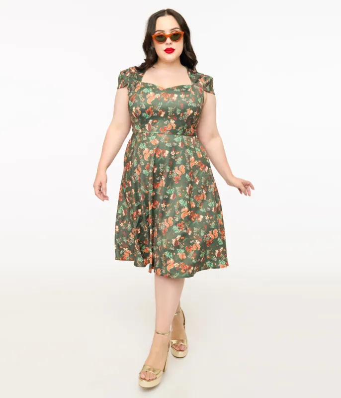 Voodoo Vixen Plus Size 1950s Green Woodland Squirrel Print Swing Dress sold by Unique Vintage