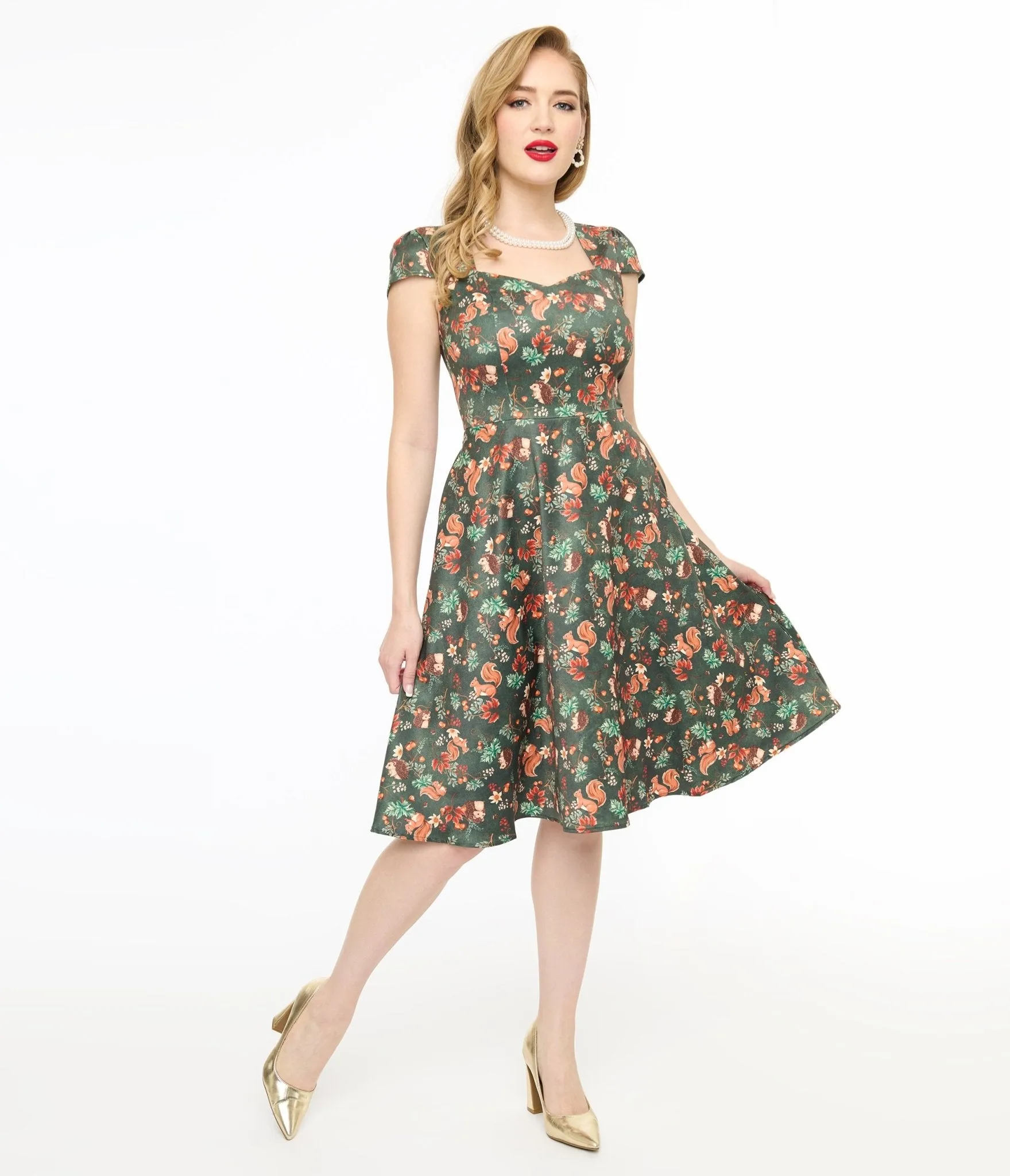 Voodoo Vixen 1950s Green Woodland Squirrel Print Swing Dress sold by Unique Vintage
