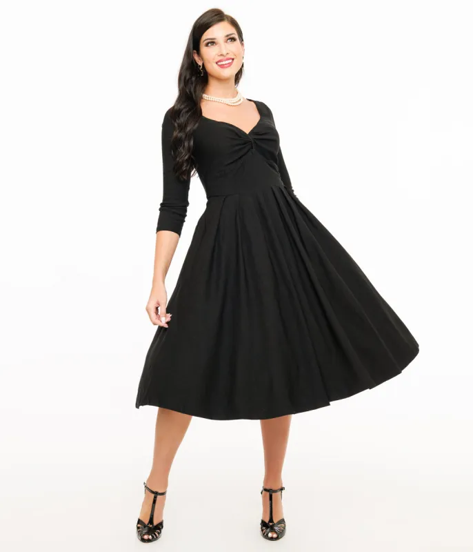 Unique Vintage 1950s Black Bengaline Front Twist Swing Dress sold by Unique Vintage