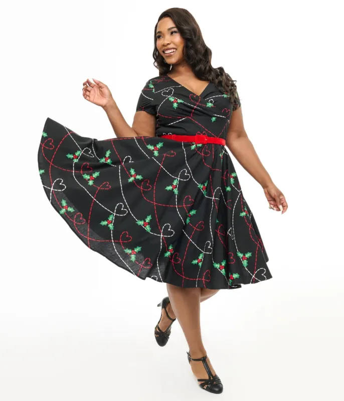 Hell Bunny Plus Size 1950s Festive Hearts & Holly Print Angelica Swing Dress sold by Unique Vintage