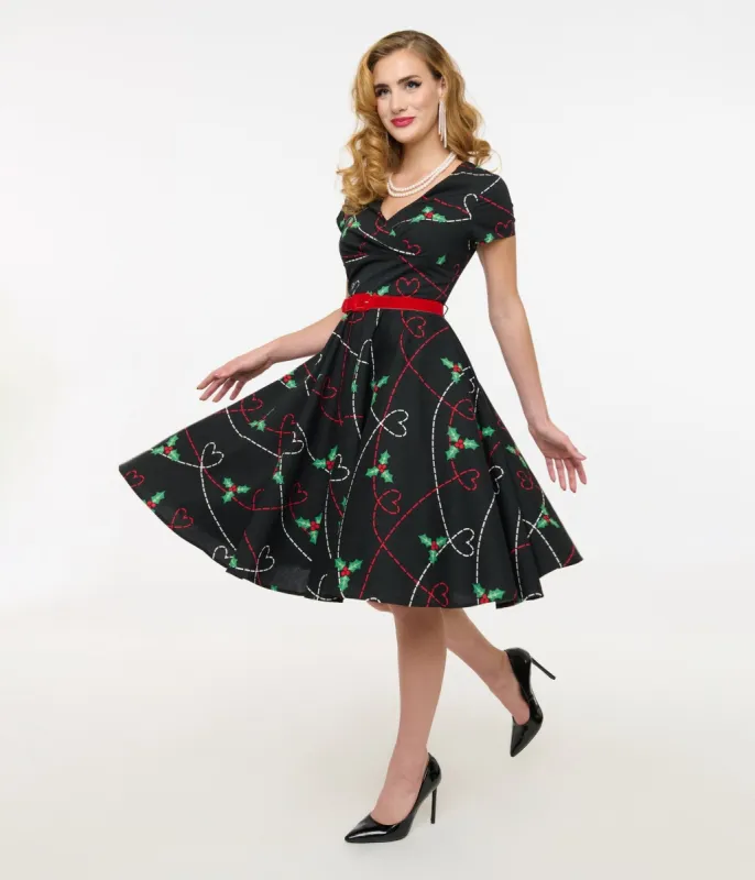 Hell Bunny 1950s Festive Hearts & Holly Print Angelica Swing Dress sold by Unique Vintage