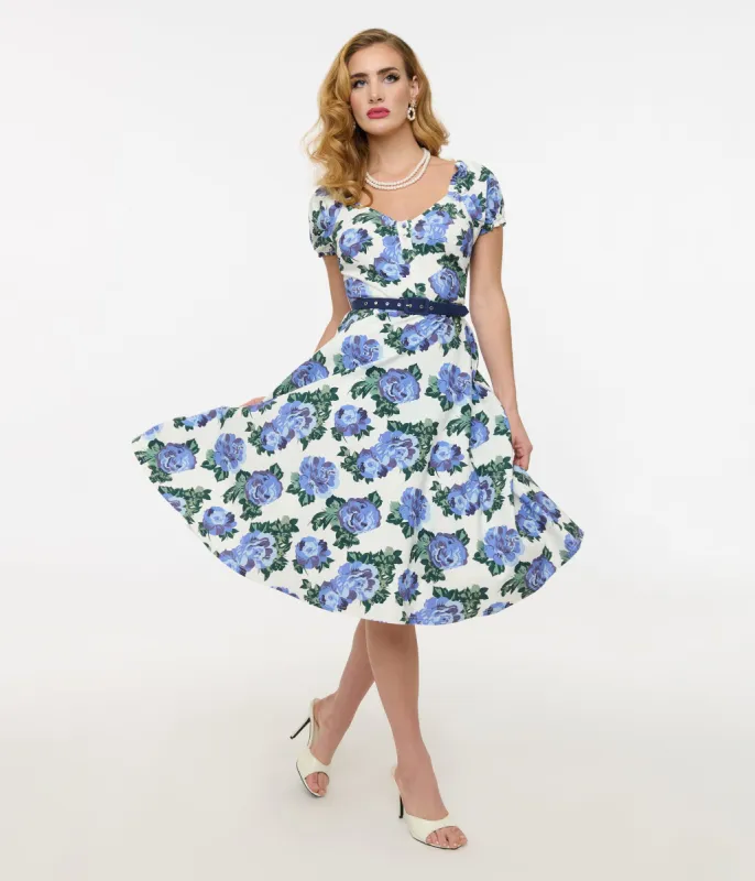 Unique Vintage 1960s Blue Winter Floral Ohara Swing Dress sold by Unique Vintage