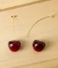 Gold Stem Cherry Earrings sold by Unique Vintage