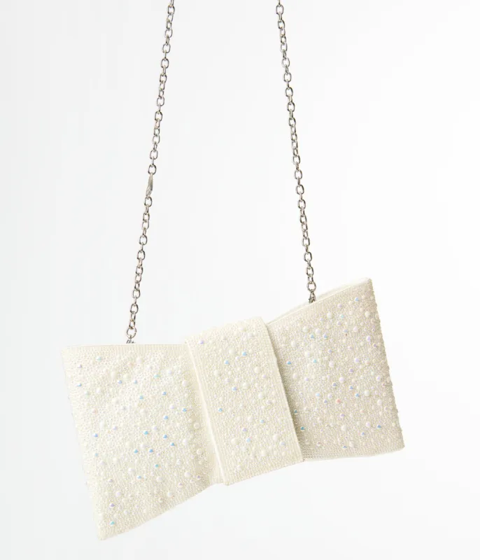 Betsey Johnson Pearl Bow Crossbody Clutch sold by Unique Vintage