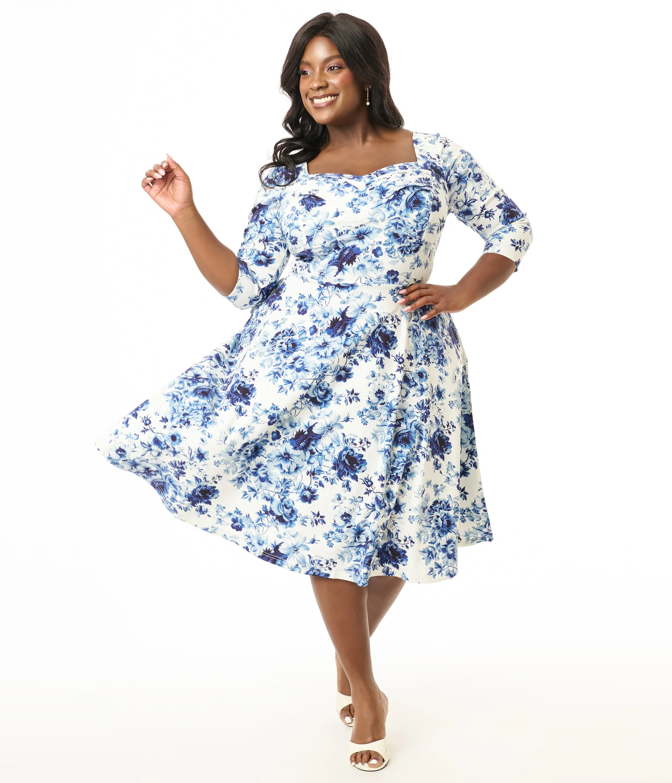 Unique Vintage Plus Size 1950s White & Blue Floral Pleated Bust Swing Dress sold by Unique Vintage