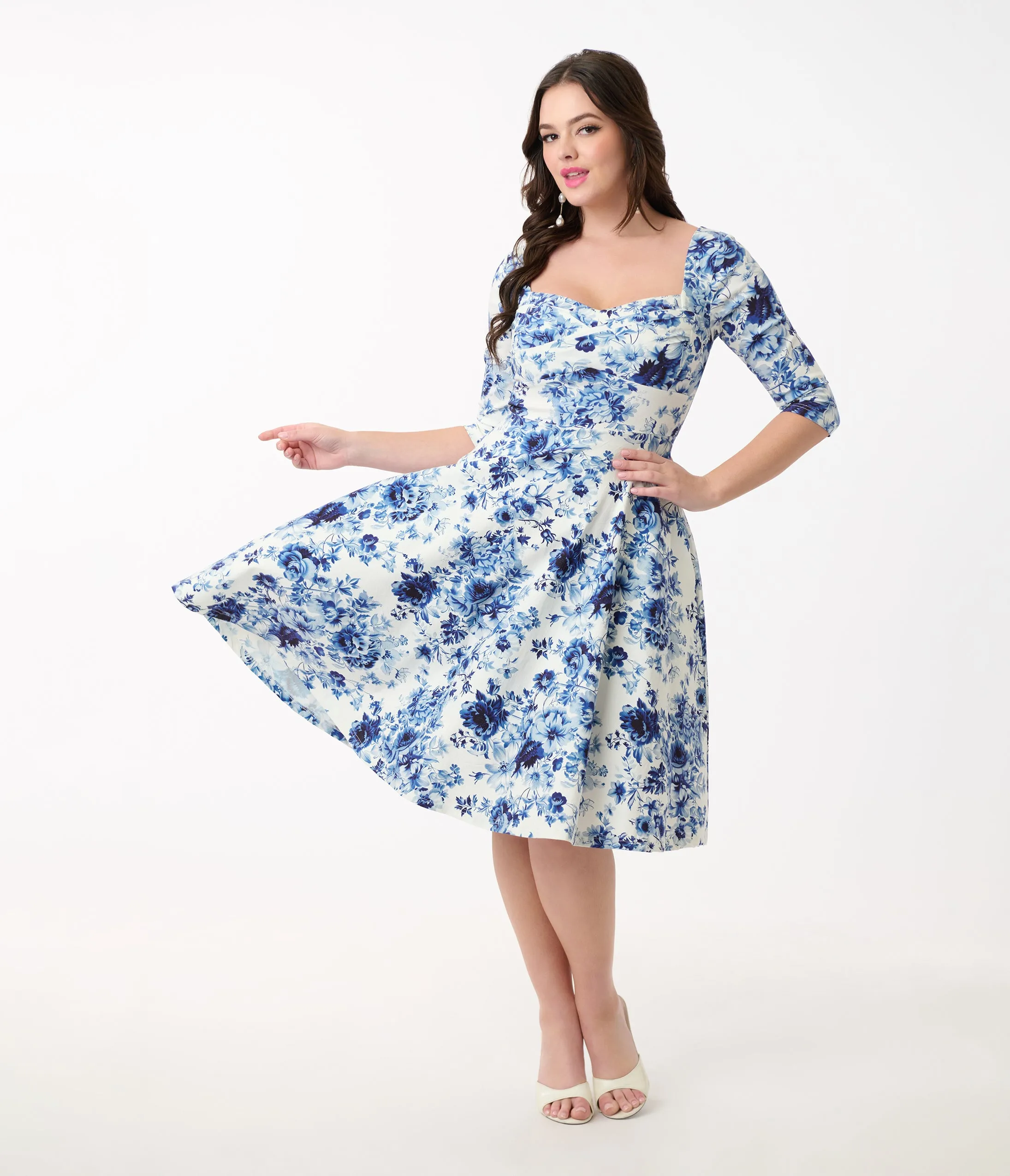 Unique Vintage 1950s White & Blue Floral Pleated Bust Swing Dress sold by Unique Vintage