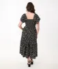 Unique Vintage 1960s Black & White Ditsy Floral Smocked Bodice Midi Dress sold by Unique Vintage