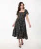 Unique Vintage 1960s Black & White Ditsy Floral Smocked Bodice Midi Dress sold by Unique Vintage