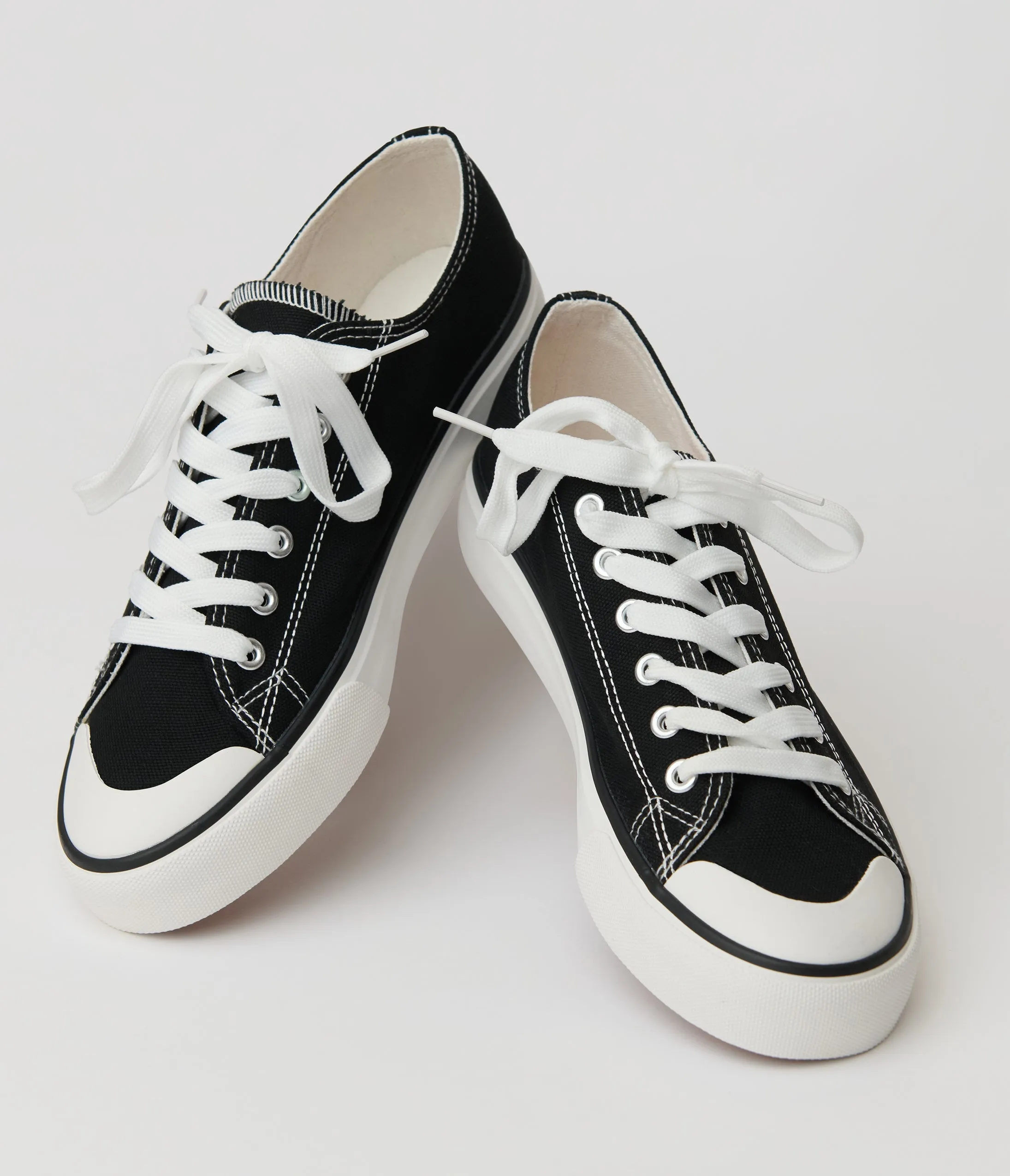Black Lace Up Canvas Sneakers sold by Unique Vintage