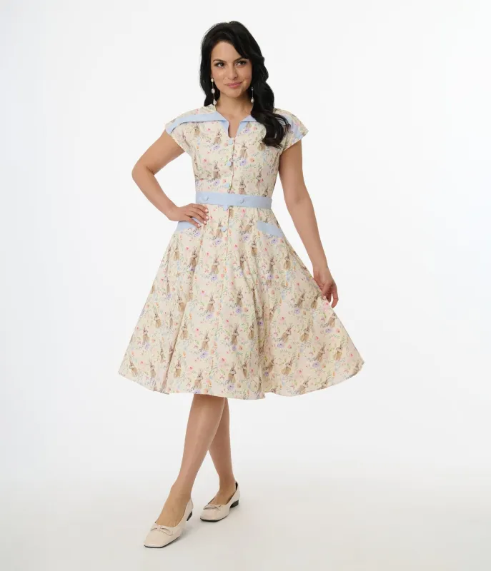 Unique Vintage 1950s Cream & Light Blue Bunny Rabbit Print Hedda Swing Dress sold by Unique Vintage