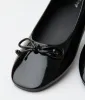 1960s Black Patent Leatherette Bow Flats sold by Unique Vintage