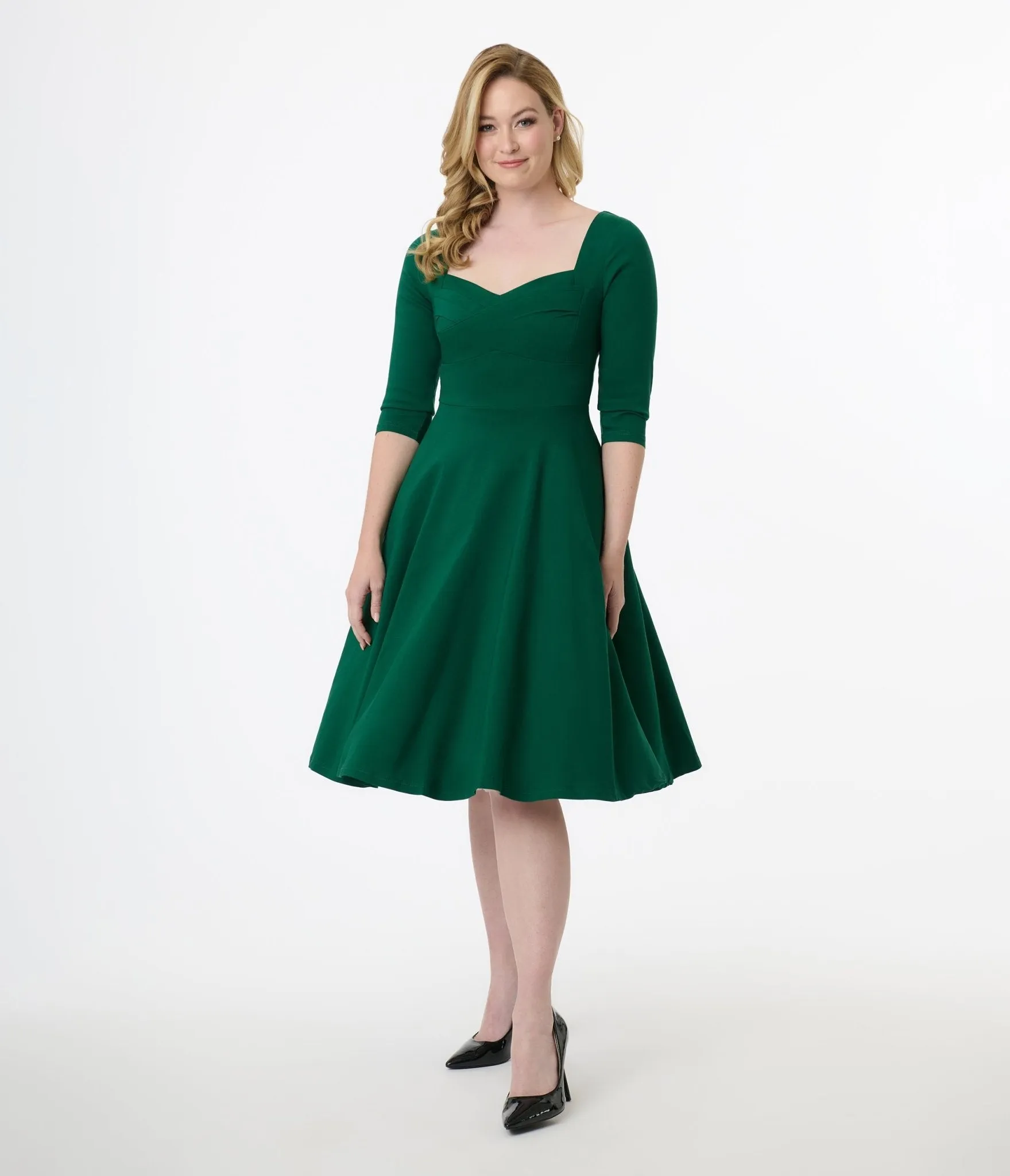 Unique Vintage 1950s Emerald Green Pleated Bust Swing Dress sold by Unique Vintage