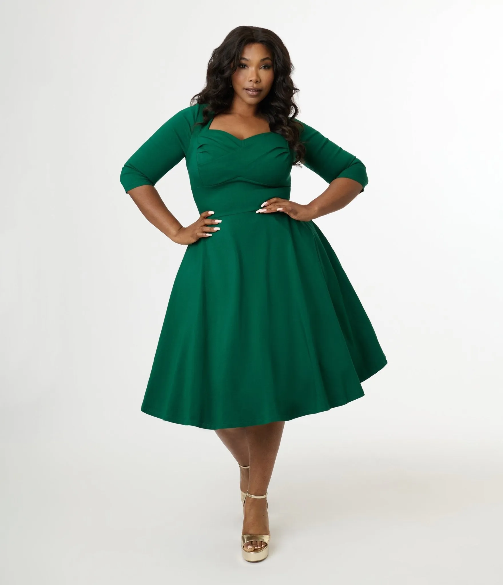 Unique Vintage Plus Size 1950s Emerald Green Pleated Bust Swing Dress sold by Unique Vintage
