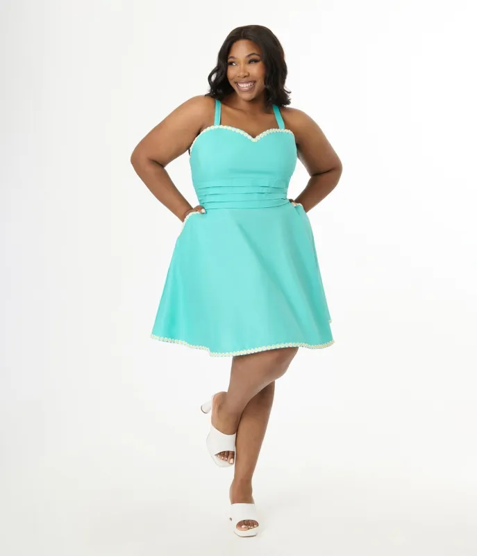 Unique Vintage Plus Size Seafoam Green & Daisy Cotton Flare Dress made by Unique Vintage