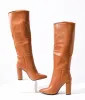 1970s Brown Leatherette Pointed Toe Knee-High Boots sold by Unique Vintage
