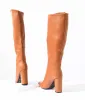 1970s Brown Leatherette Pointed Toe Knee-High Boots sold by Unique Vintage