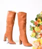 1970s Brown Leatherette Pointed Toe Knee-High Boots sold by Unique Vintage