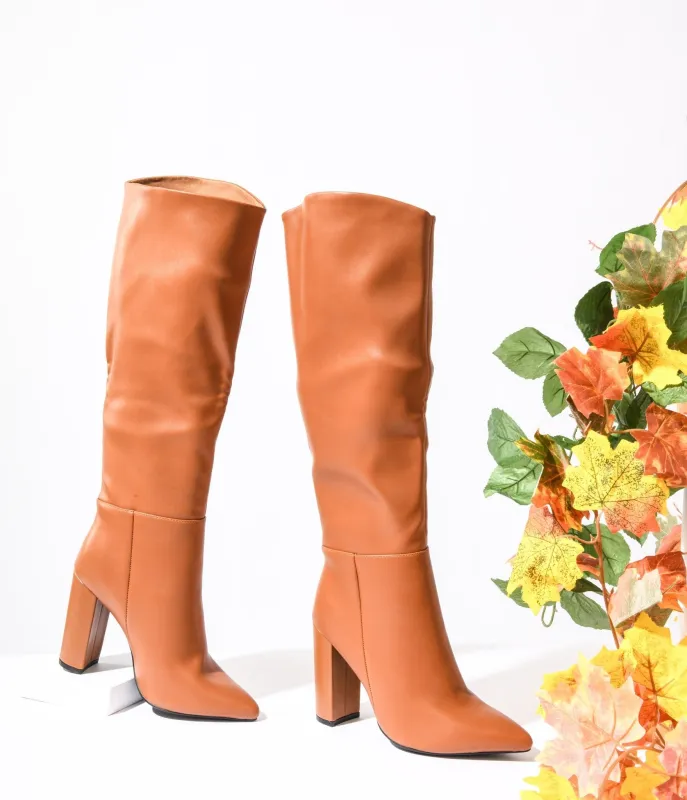 1970s Brown Leatherette Pointed Toe Knee-High Boots sold by Unique Vintage