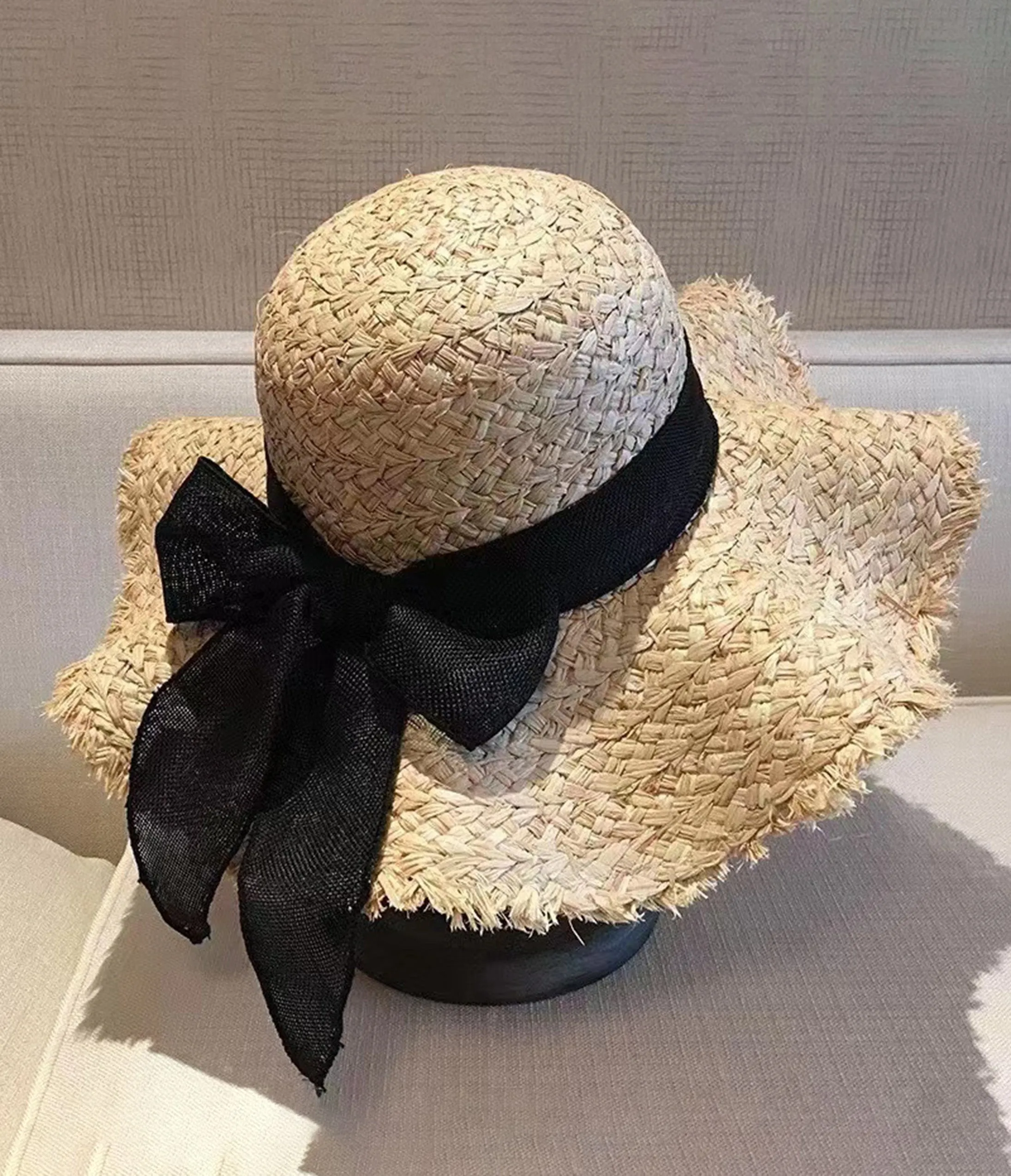 Beige & Black Bow Straw Sun Hat sold by Unique Vintage